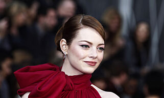 FILE - In this Feb. 26, 2012 file photo, actress Emma Stone arrives before the 84th Academy Awards, in the Hollywood section of Los Angeles. (AP Photo/Matt Sayles, File)