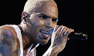 Singer Chris Brown performs in concert during the F.A.M.E. Tour in Los Angeles in this October 20, 2011 file photo. Brown was given the go-ahead to carry out his European tour after a Los Angeles judge said on November 1, 2012 that the entertainer was in compliance with probation imposed for his 2009 assault on former girlfriend Rihanna. REUTERS/Danny Moloshok/Files (UNITED STATES - Tags: ENTERTAINMENT CRIME LAW SOCIETY)