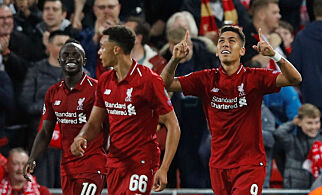 Soccer Football - Champions League - Group Stage - Group C - Liverpool v Paris St Germain - Anfield, Liverpool, Britain - September 18, 2018 Liverpool's Roberto Firmino celebrates scoring their third goal REUTERS/Phil Noble